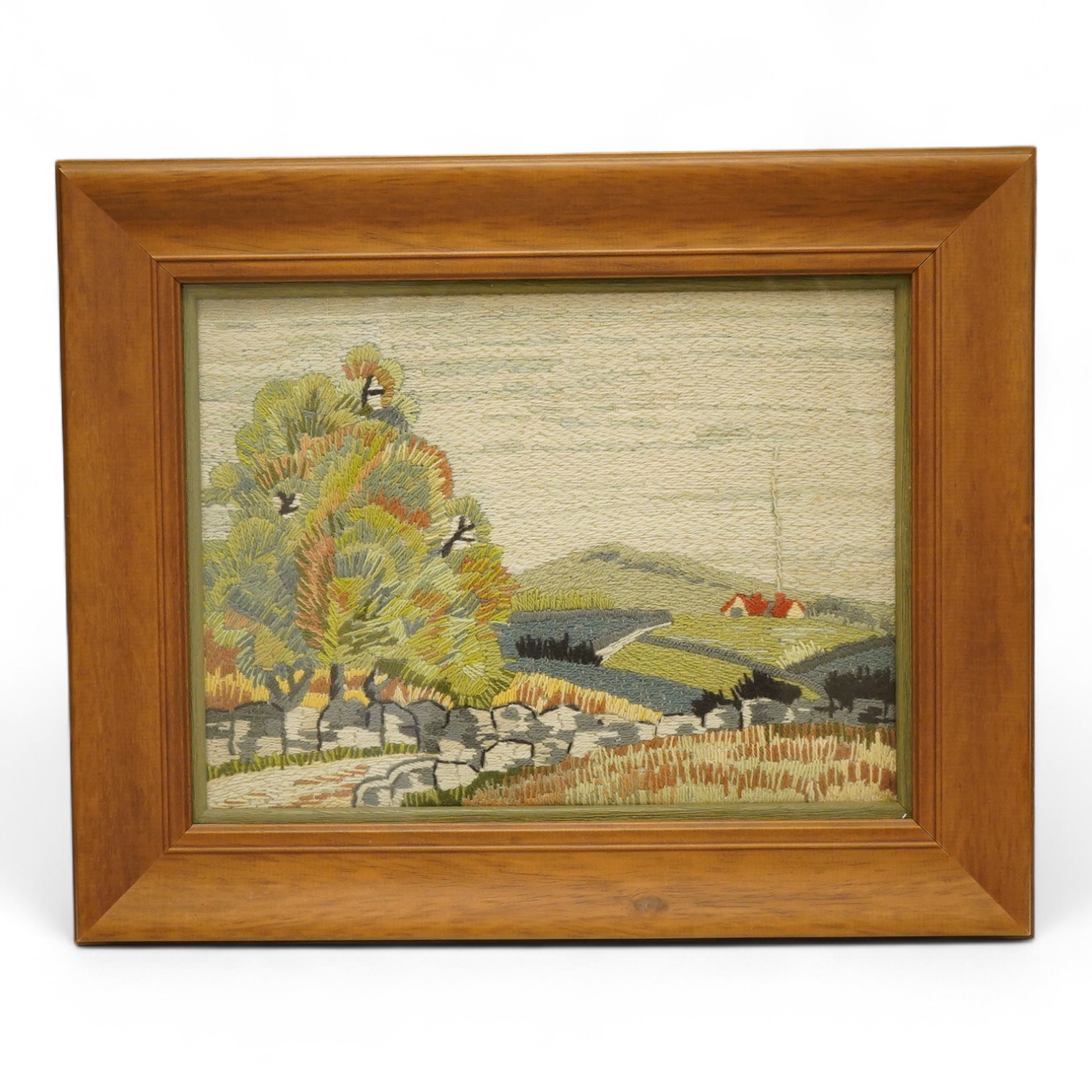 A framed 1930's woolwork landscape framed picture, 29cm x 23cm